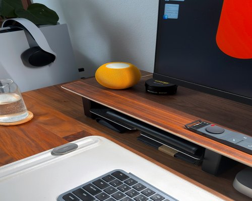 comfortable workspace with water on the desk
